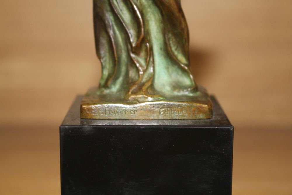 Max Le Verrier (1891-1973). A bronze group La Victoire de Samothrace, on black marble plinth, overall height 23.5cm